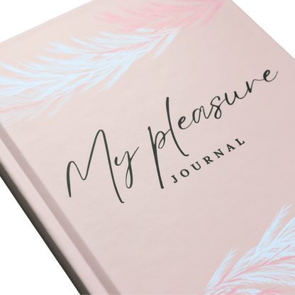 Journal with 'My pleasure' text on a pink cover with abstract designs